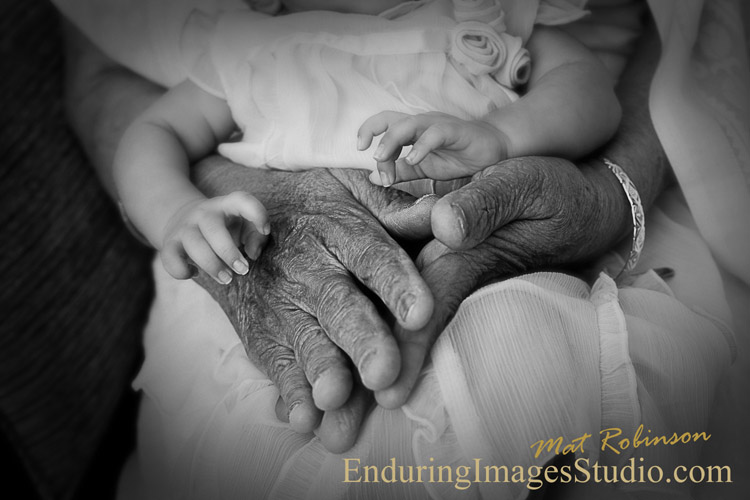 Black and white portrait of newborn baby hands with great grandmother - Denville