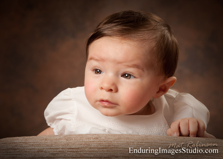 Baptism photographs in studio with wonderful christening gown, taken by Mat Robinson